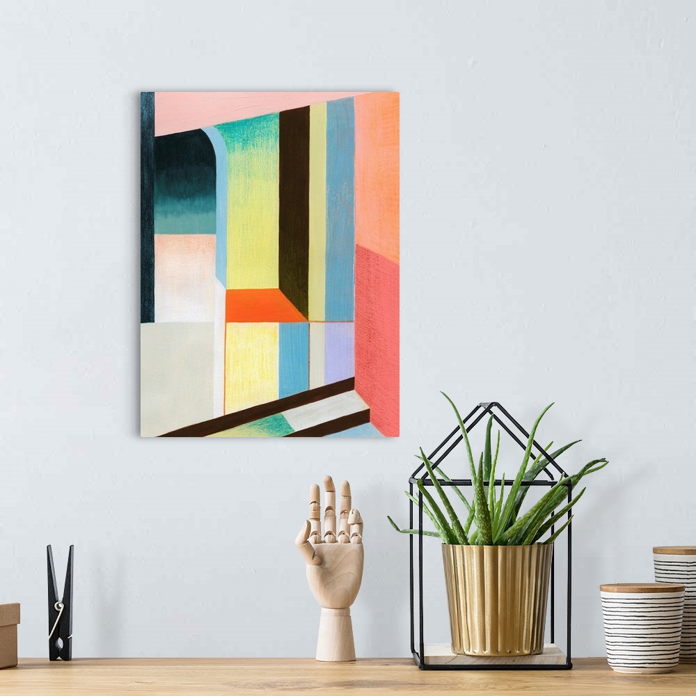 A bohemian room featuring A brightly colored geometric abstract piece featuring an archway and block shapes that appear to ...