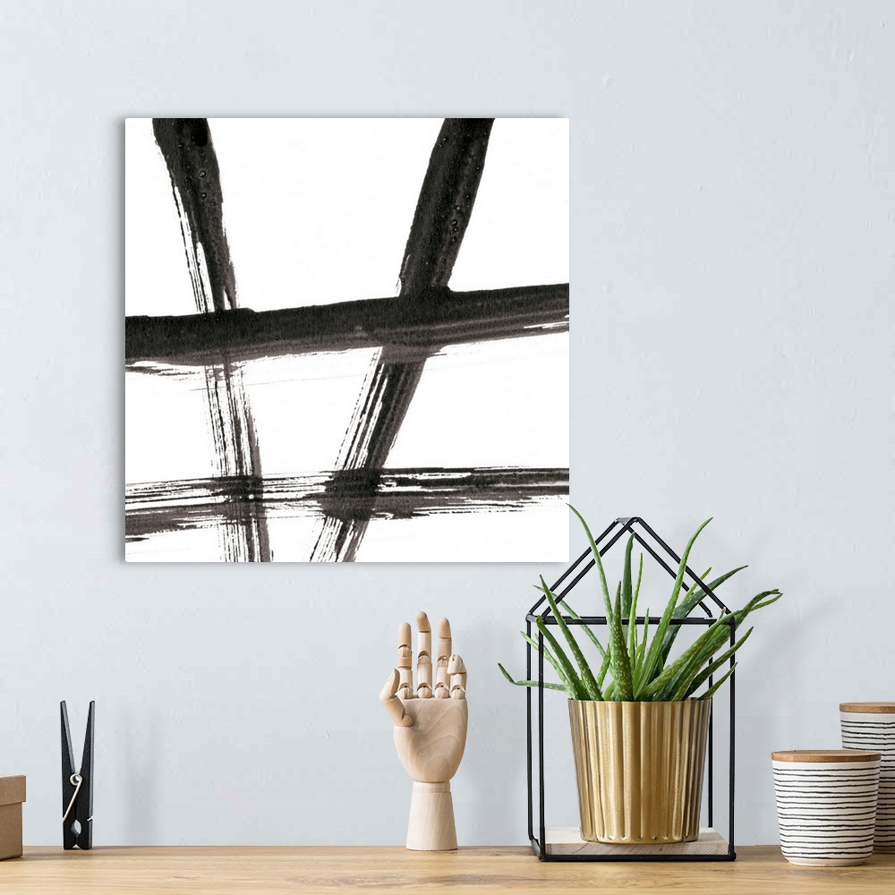 A bohemian room featuring Black and white gestural painting with broad brushstrokes.