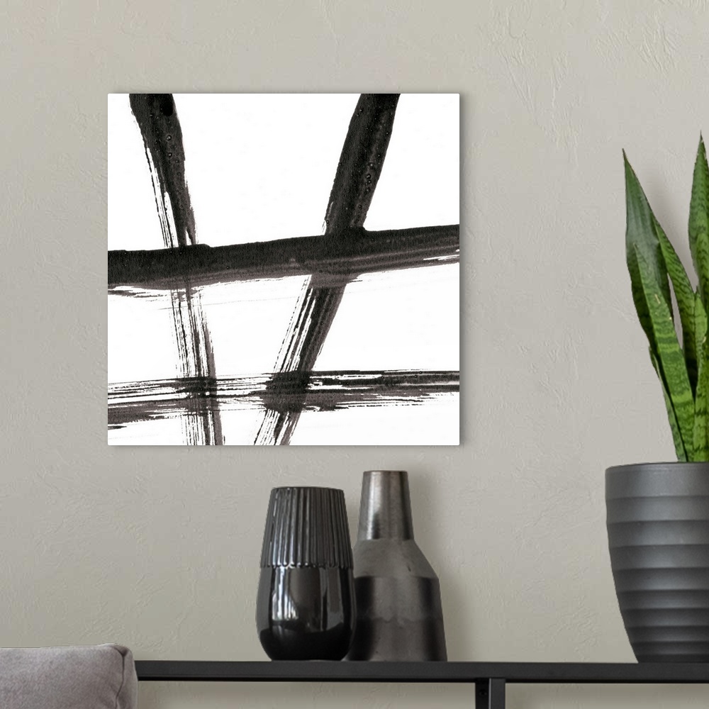 A modern room featuring Black and white gestural painting with broad brushstrokes.