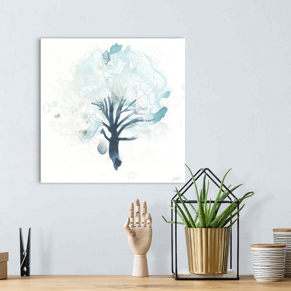 A bohemian room featuring Watercolor painting of a tree in watered down blue shades with blurred spots.