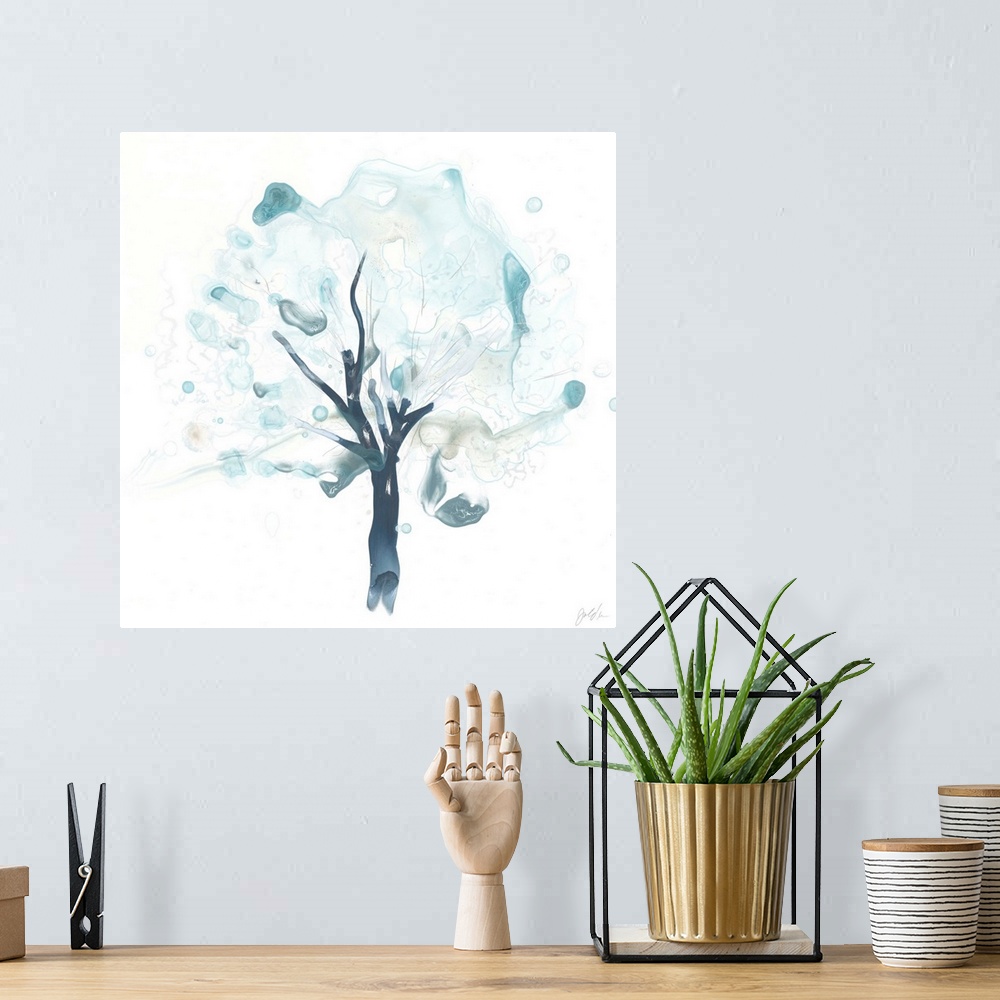 A bohemian room featuring Watercolor painting of a tree in watered down blue shades with blurred spots.