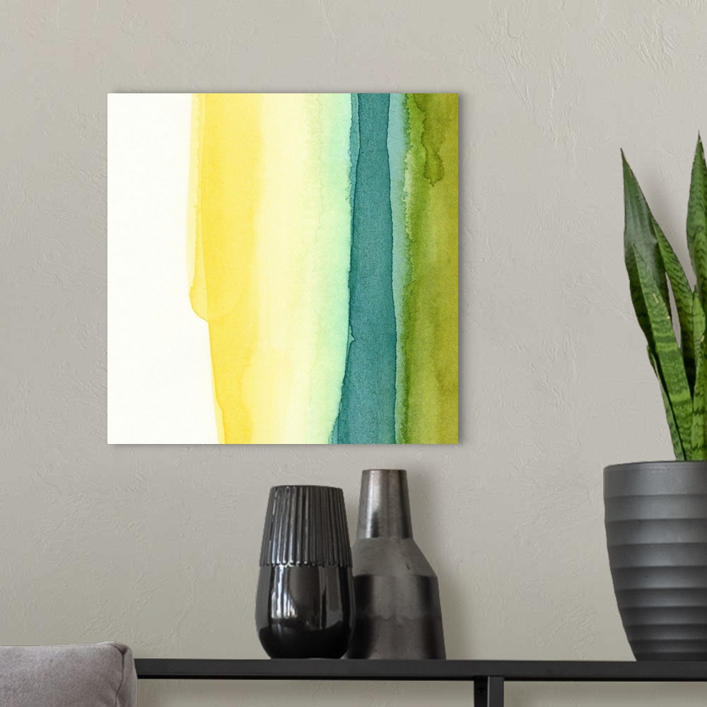 A modern room featuring An abstract piece of artwork with several water colors running vertically on majority of the print.