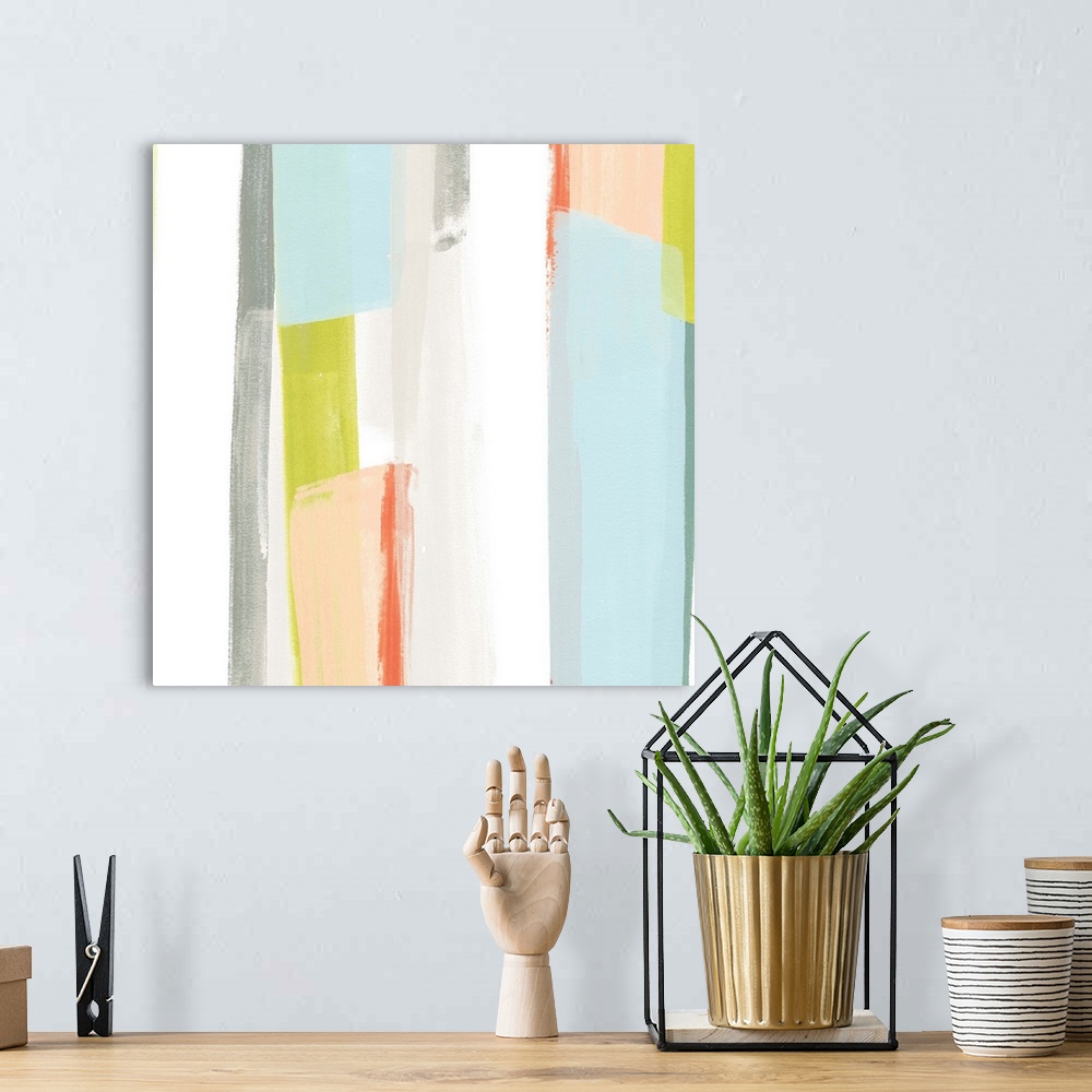 A bohemian room featuring Pastel abstract painting of vertical stripes in blue, yellow, and peach.