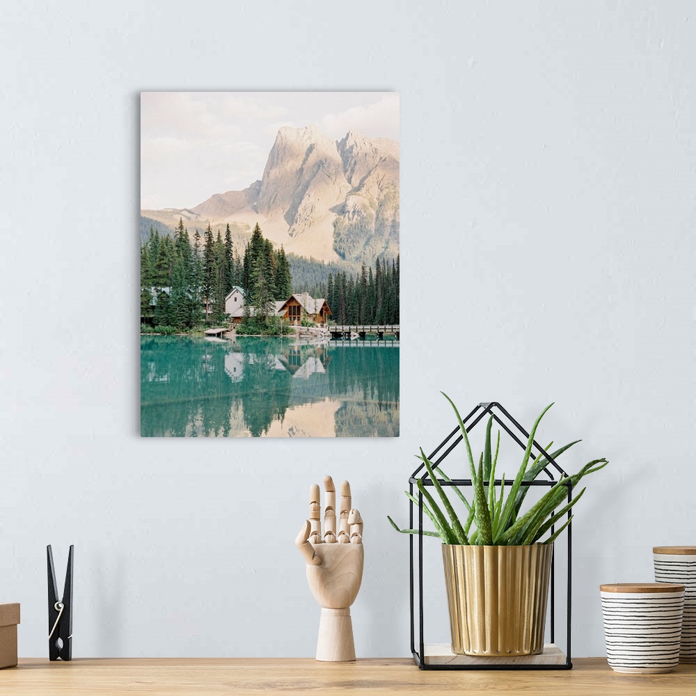A bohemian room featuring Photograph of Emerald Lake Lodge and surrounding trees reflected in Moraine Lake, Banff, Canada.
