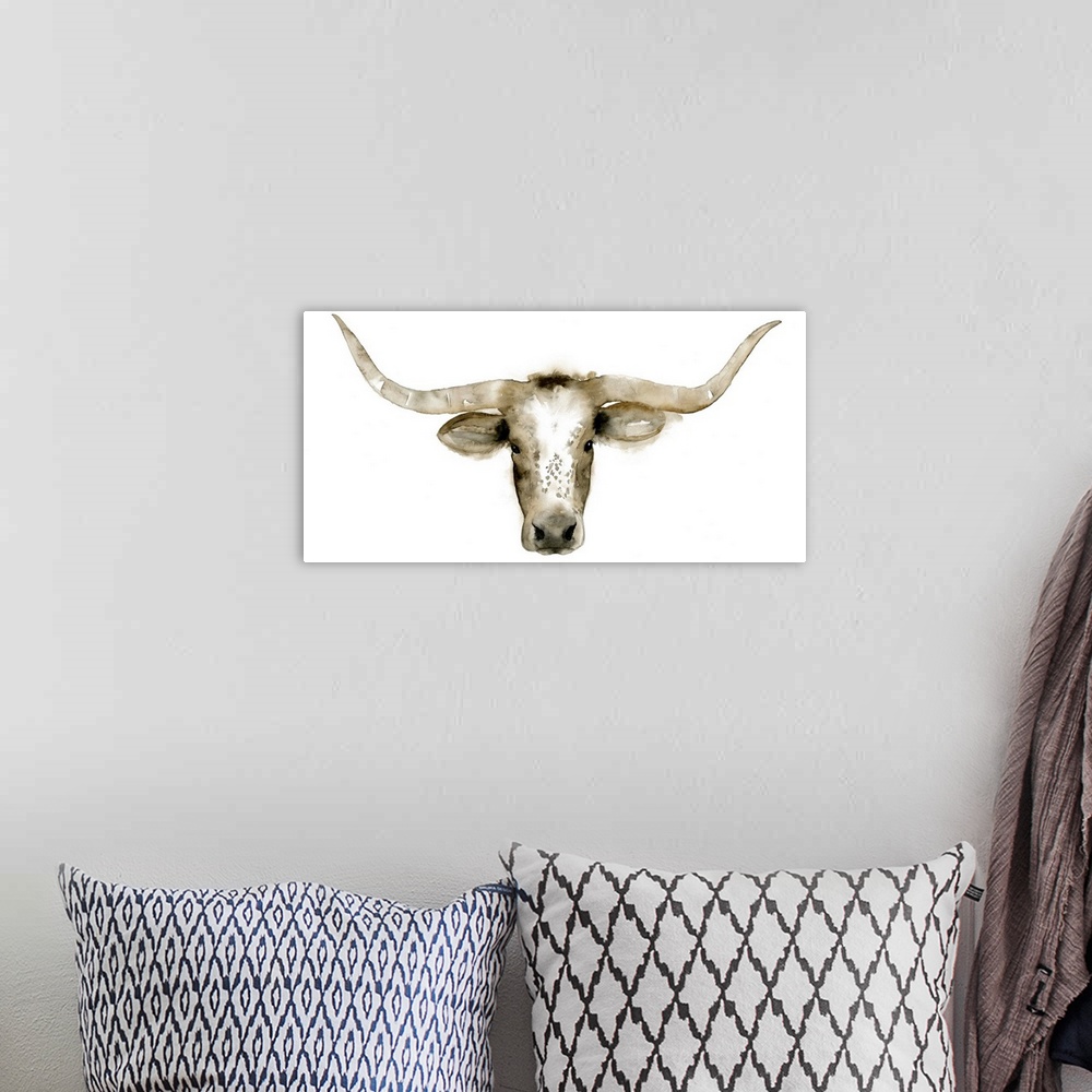 A bohemian room featuring Watercolor head-on artwork of a longhorn steer on white.