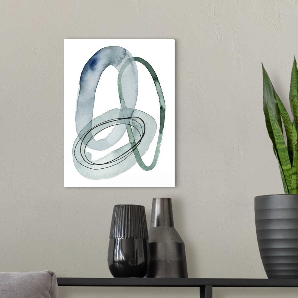 A modern room featuring A series of interlocking watercolor rings in varying thickness and textures overlap a white backg...