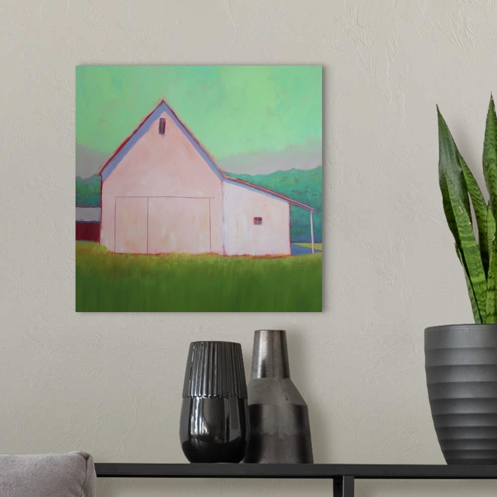 A modern room featuring Square artwork of an agricultural building on a green countryside against a bright mint sky.