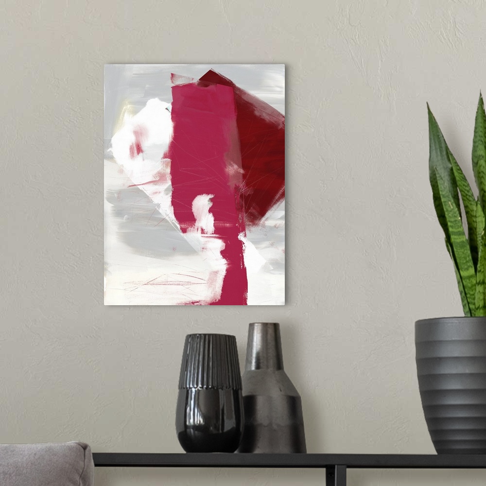 A modern room featuring Abstract artwork with in contrasting shades of grey and deep red.