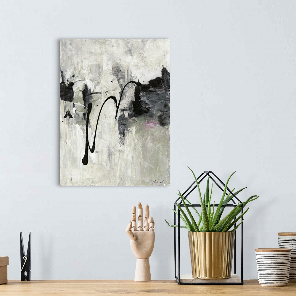 A bohemian room featuring Abstract art in neutral grey shades with deep black splatters.