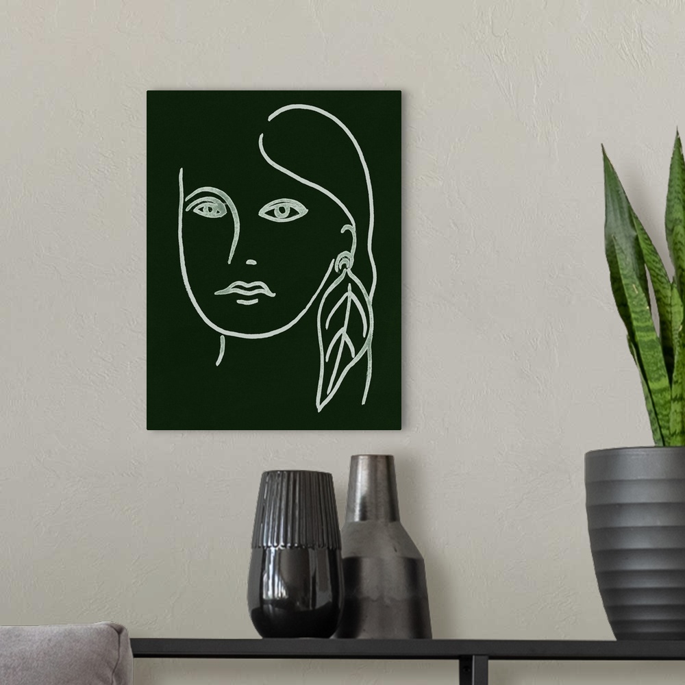A modern room featuring Portrait outline of a woman wearing a feather earring on a dark green background.