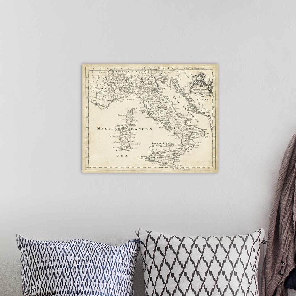 A bohemian room featuring Map of Italy