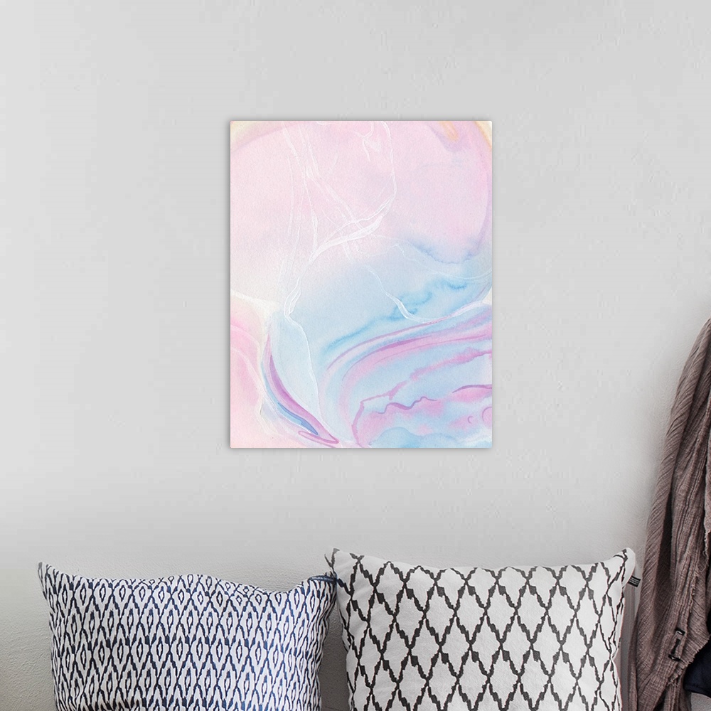 A bohemian room featuring A vertical abstract painting of watercolor pastel colors in pink and blue.