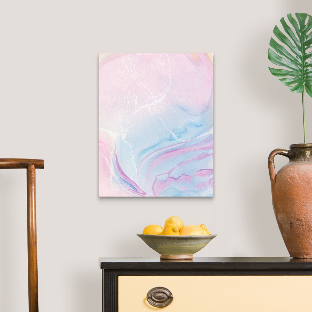 A traditional room featuring A vertical abstract painting of watercolor pastel colors in pink and blue.