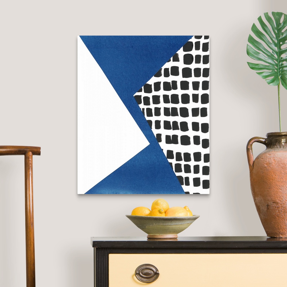 A traditional room featuring One cut paper collage in a series of geometric abstracts that depicts the city of Memphis.