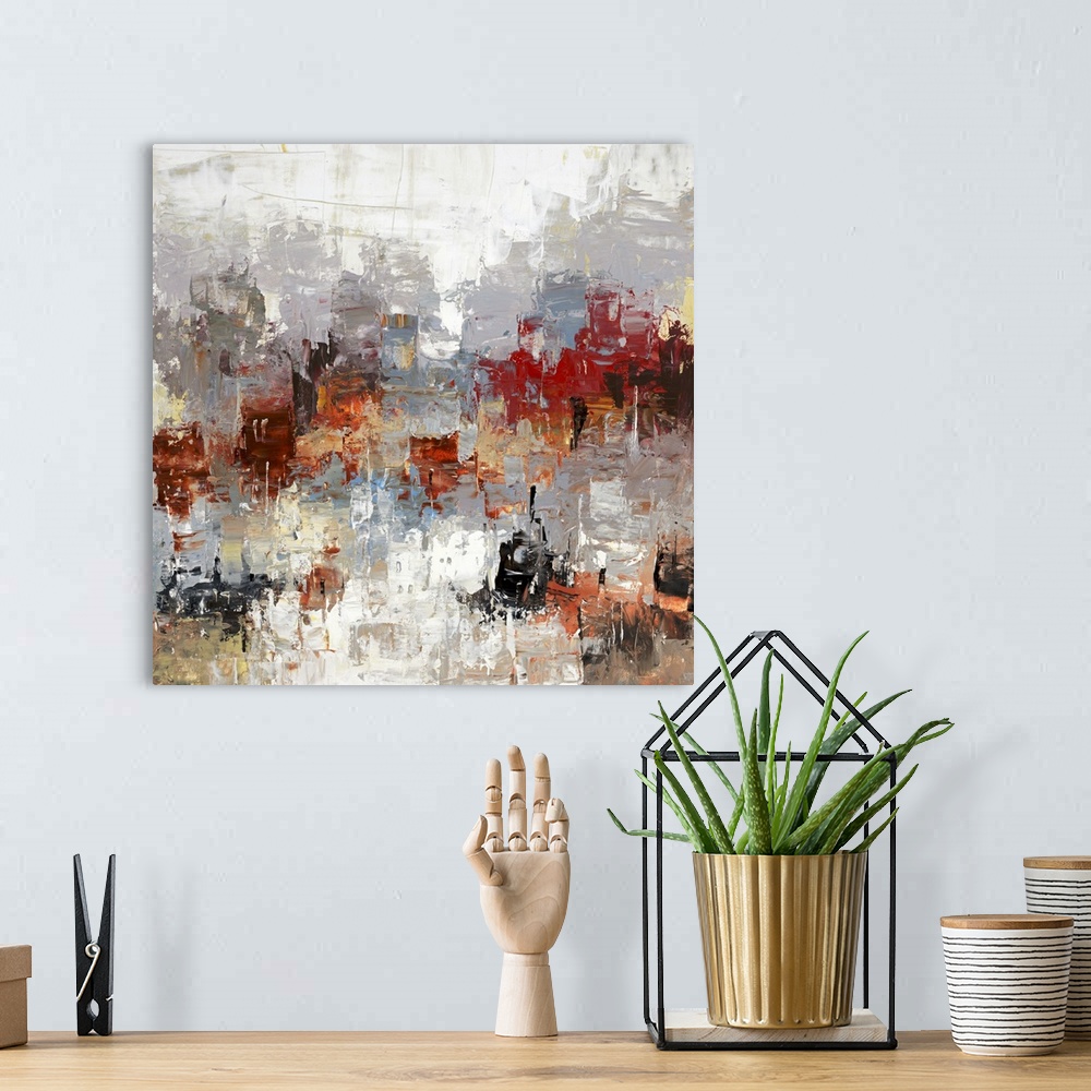 A bohemian room featuring Abstract artwork with an urban feel of buildings in a large city.