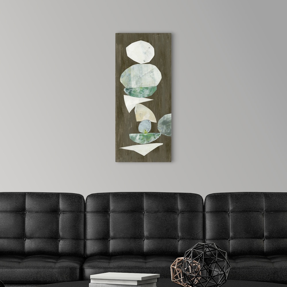 A modern room featuring Vertical abstract artwork of organic cut-out shapes on dark brown.