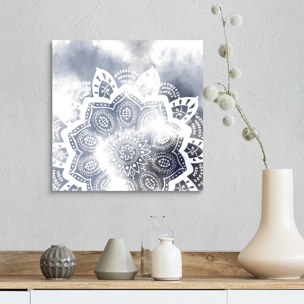 A farmhouse room featuring Decorative image of a mandala pattern in white over dark blue, fading into white.
