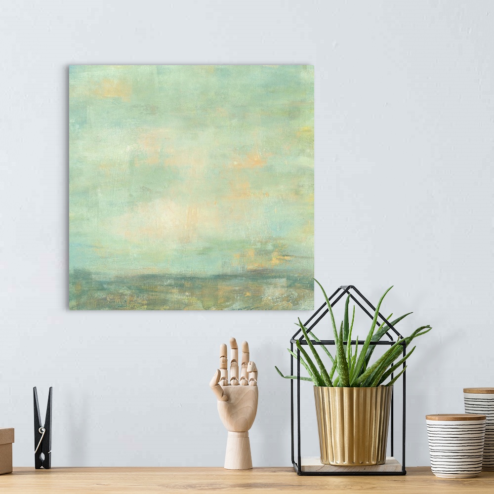 A bohemian room featuring Contemporary abstract painting using green and blue tones to create what looks like an empty sky.