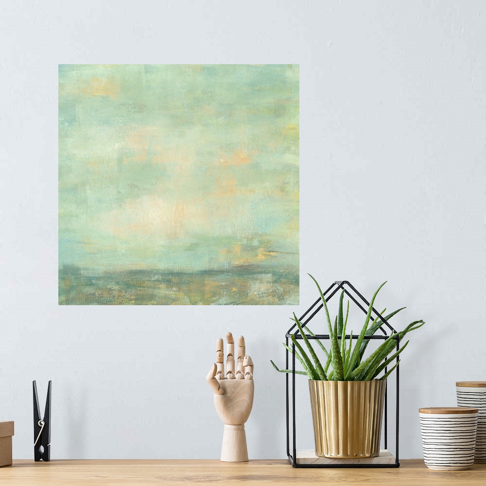 A bohemian room featuring Contemporary abstract painting using green and blue tones to create what looks like an empty sky.