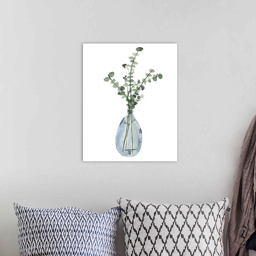 A bohemian room featuring Watercolor leaves in an indigo vase.
