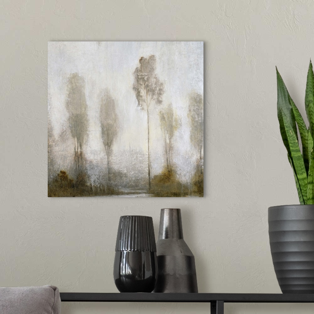 A modern room featuring A contemporary painting of a fog shrouded group of tall thin trees.