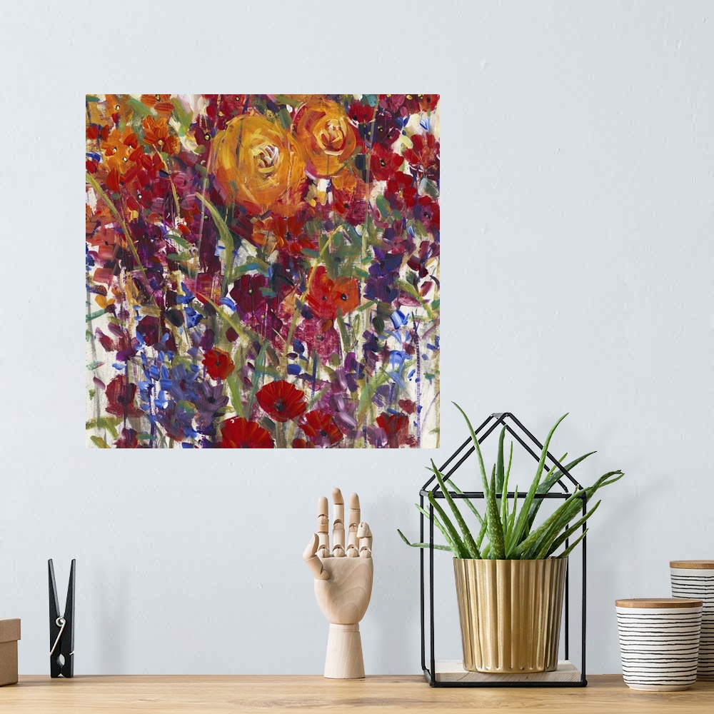 A bohemian room featuring Colorful contemporary painting of a vibrant flowers.