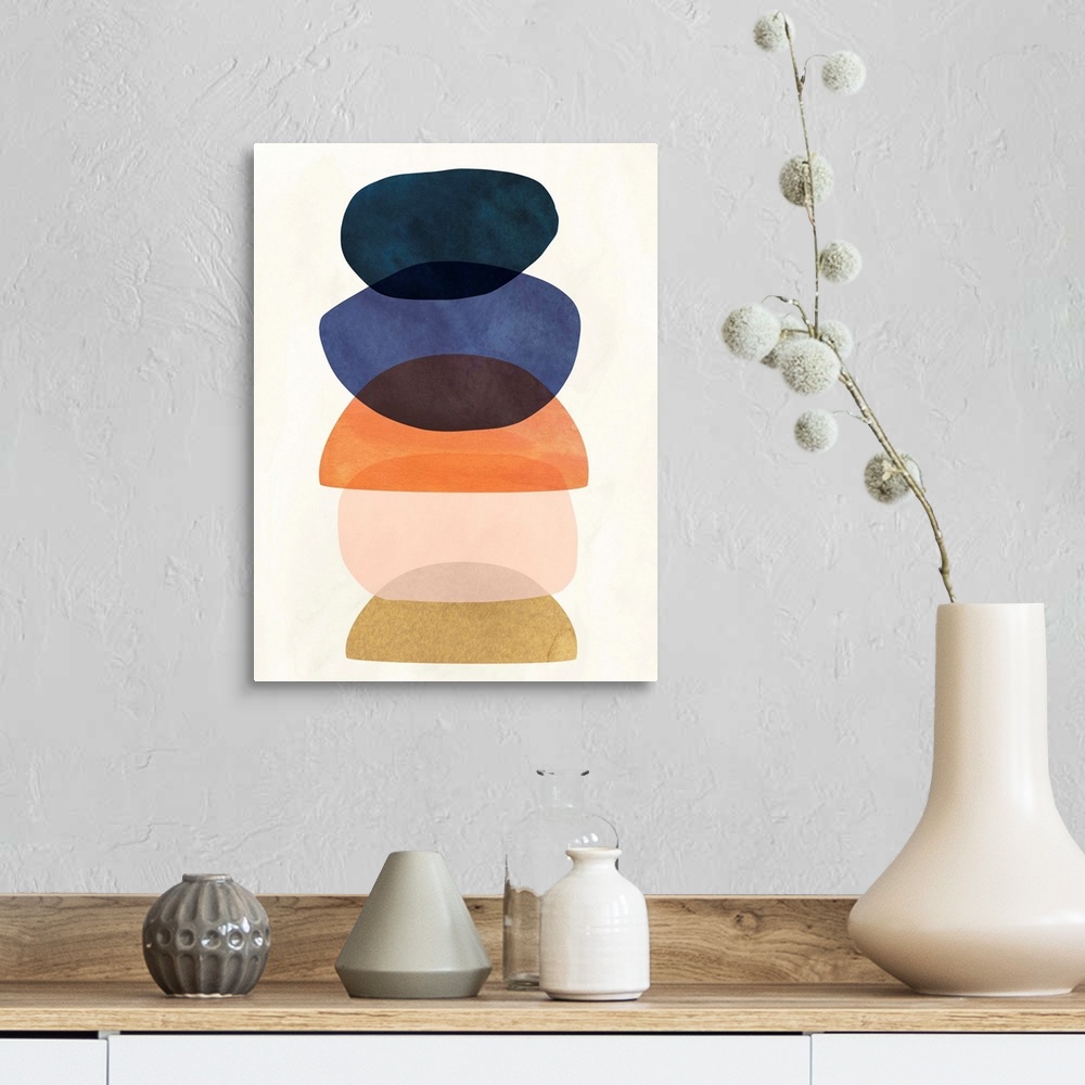A farmhouse room featuring Mid-century modern style abstract painting with multi-colored overlapping shapes.