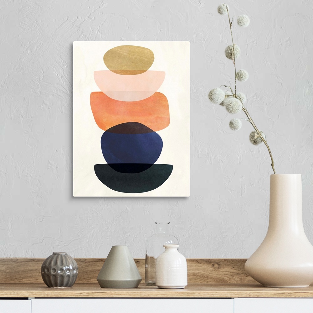 A farmhouse room featuring Mid-century modern style abstract painting with multi-colored overlapping shapes.