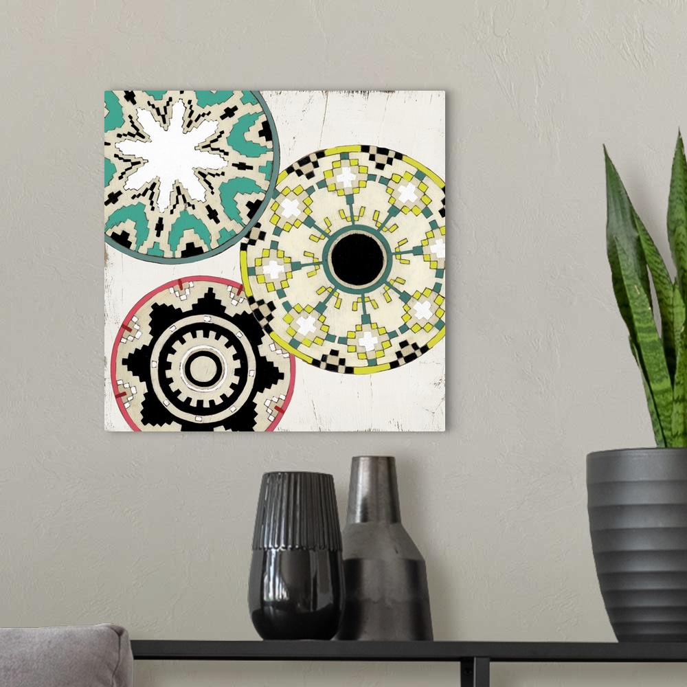 A modern room featuring Decorative image of a circular motif in bright colors, overlapping each other.
