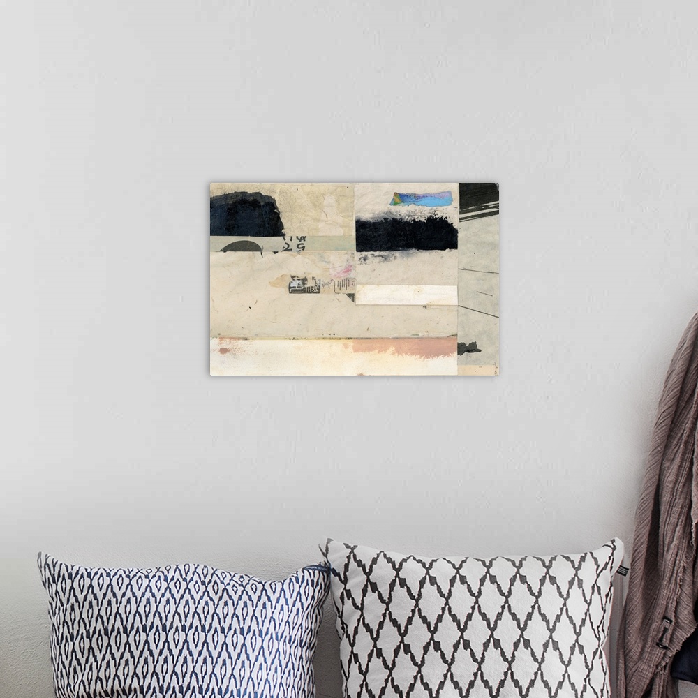 A bohemian room featuring Contemporary abstract artwork using collage style news print clippings and strokes of paint in th...