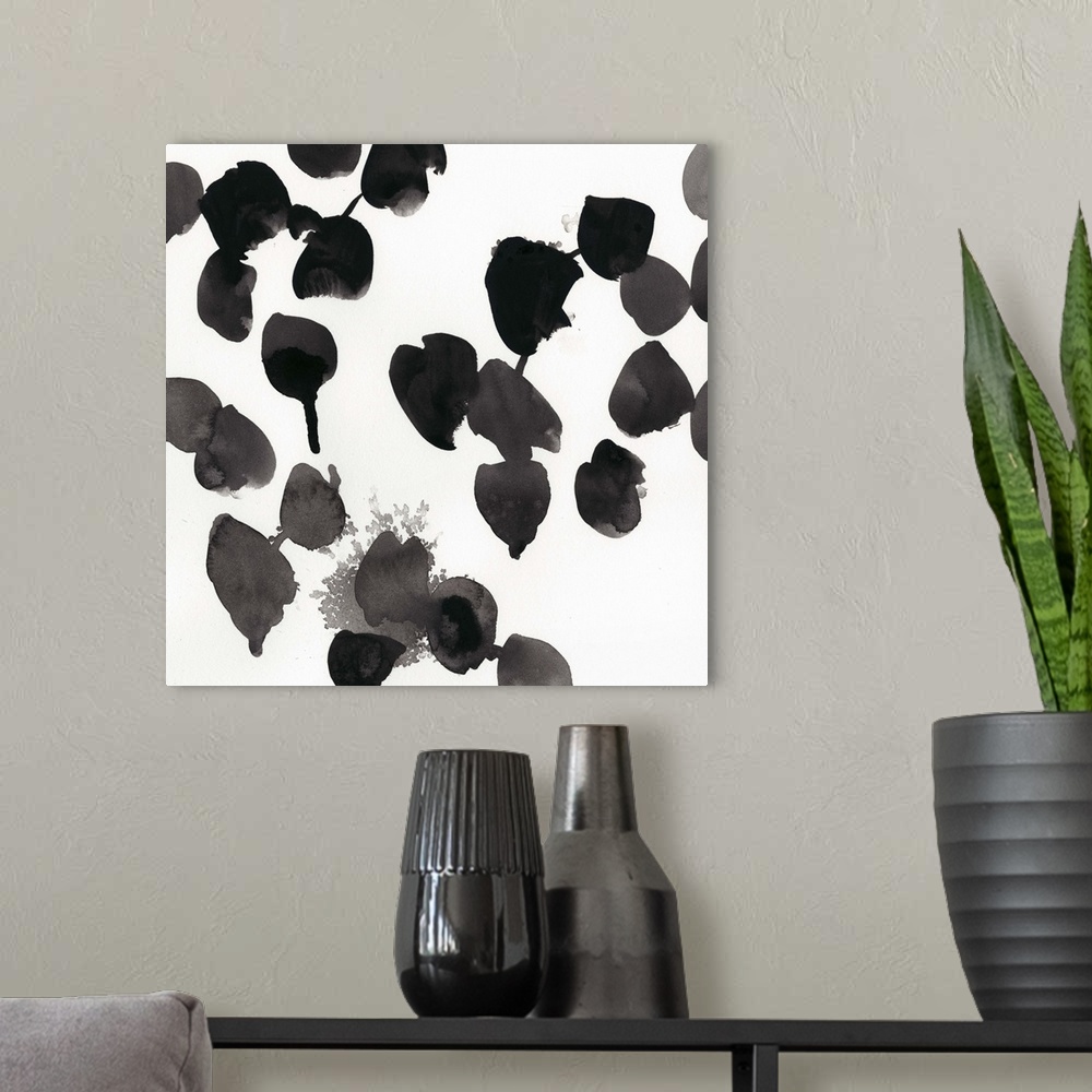 A modern room featuring Abstract contemporary artwork in stark black and white.