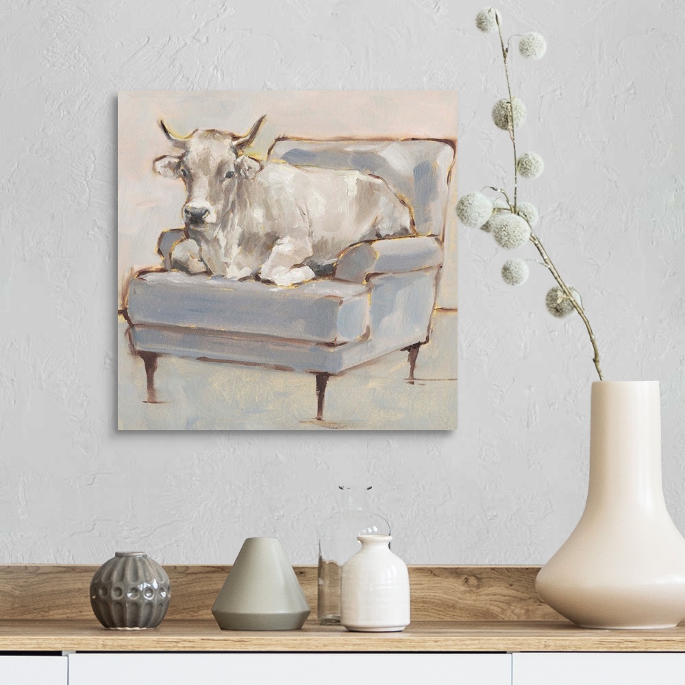 A farmhouse room featuring A whimsical composition of a large white cow lying comfortably on a luxe light blue chair. With i...