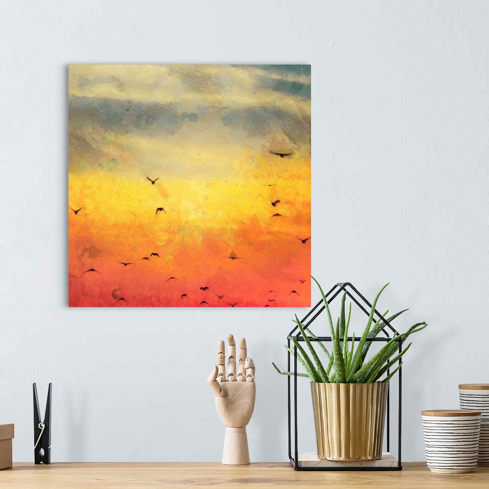 A bohemian room featuring A contemporary sunset painting with a flock of birds flying in the distance