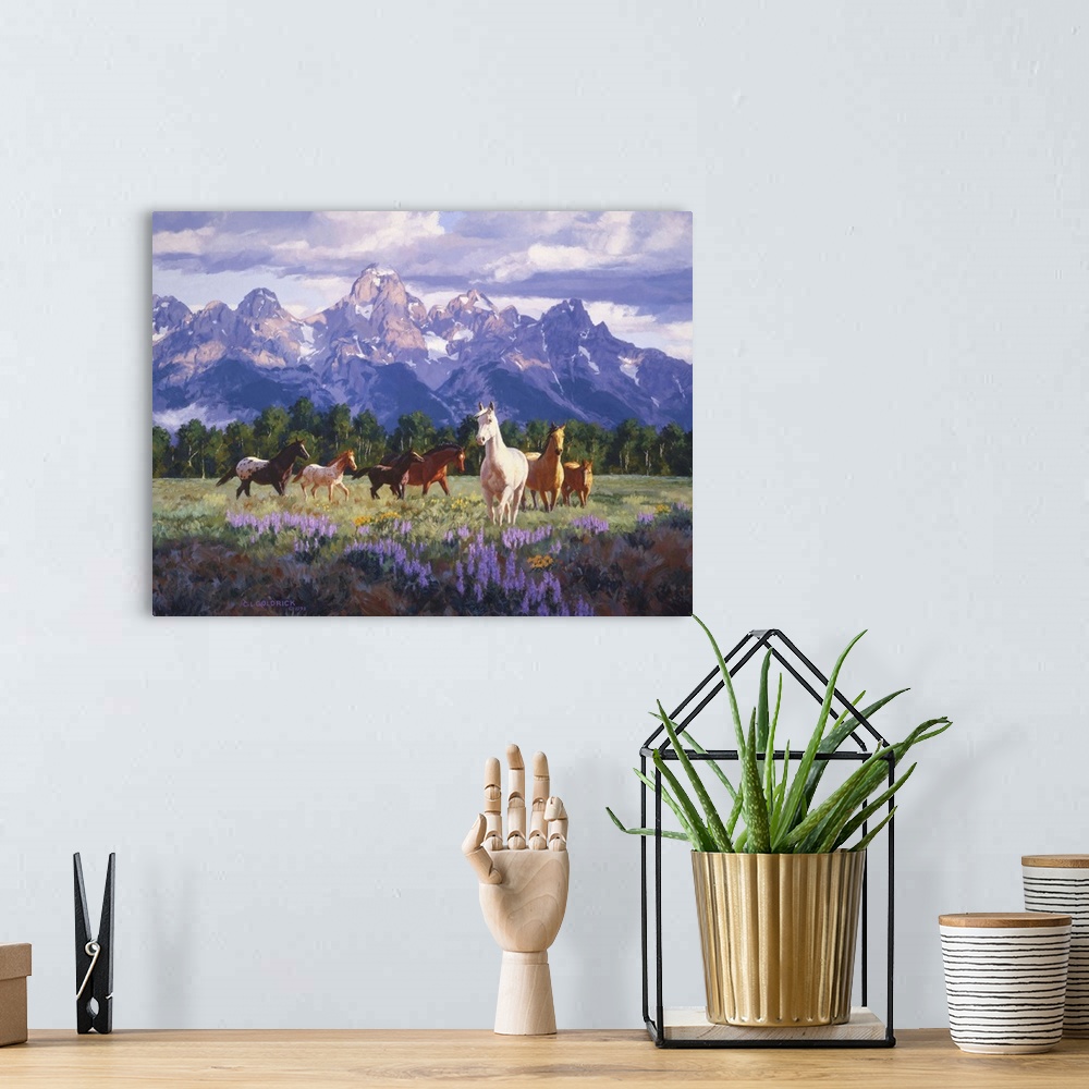 A bohemian room featuring Contemporary colorful painting of a herd of horses in a countryside clearing, with mountains in t...
