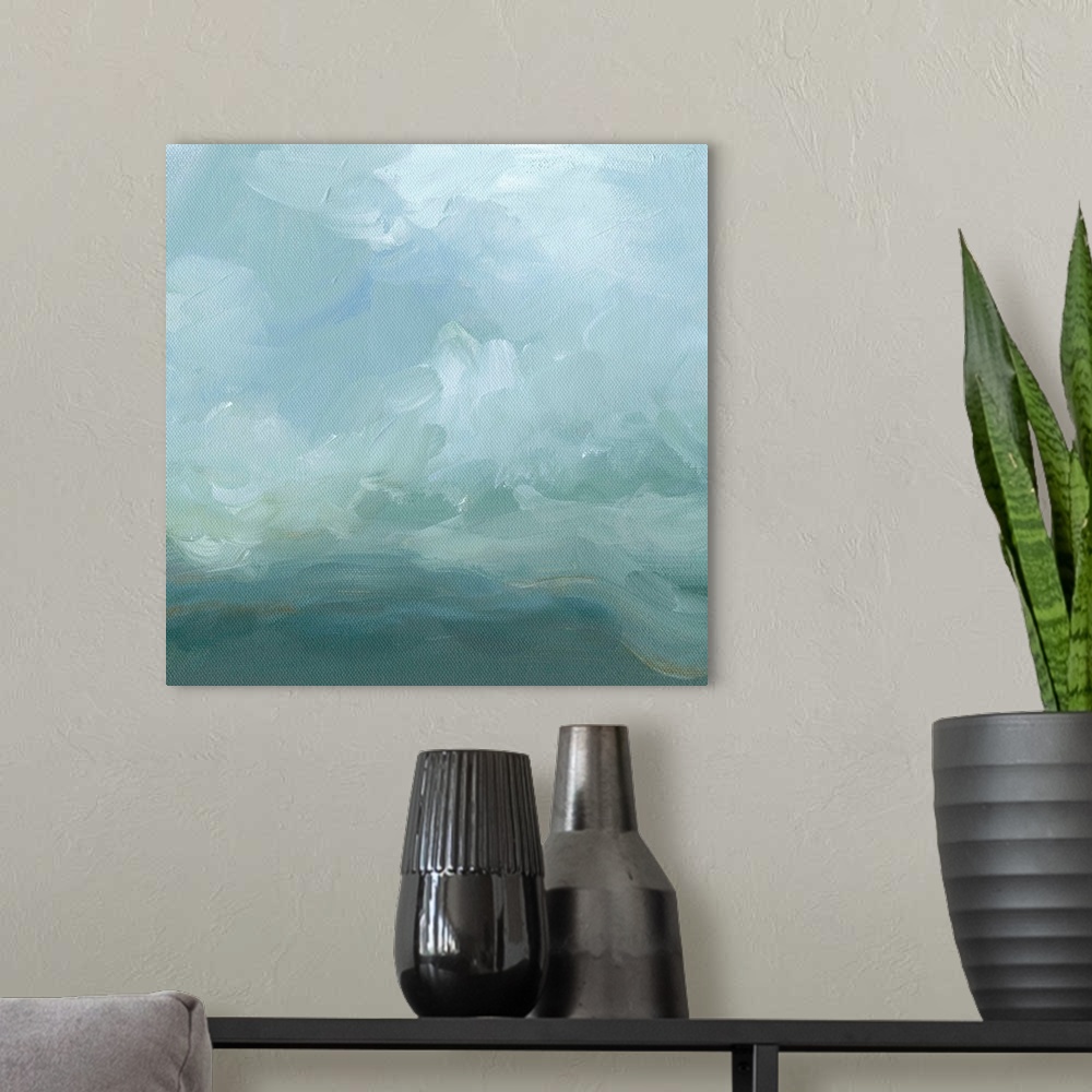 A modern room featuring Contemporary abstract painting using swirling gray and pale blue tones resembling clouds.