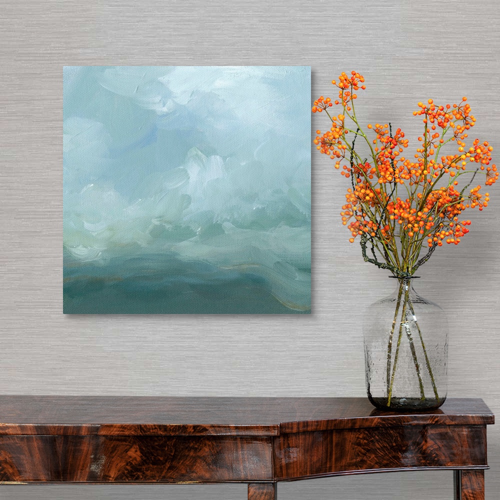 A traditional room featuring Contemporary abstract painting using swirling gray and pale blue tones resembling clouds.