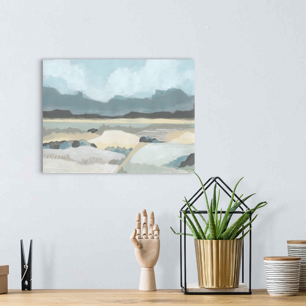 A bohemian room featuring Abstract landscape painting of a valley with mountains in the distance in pastel hues.