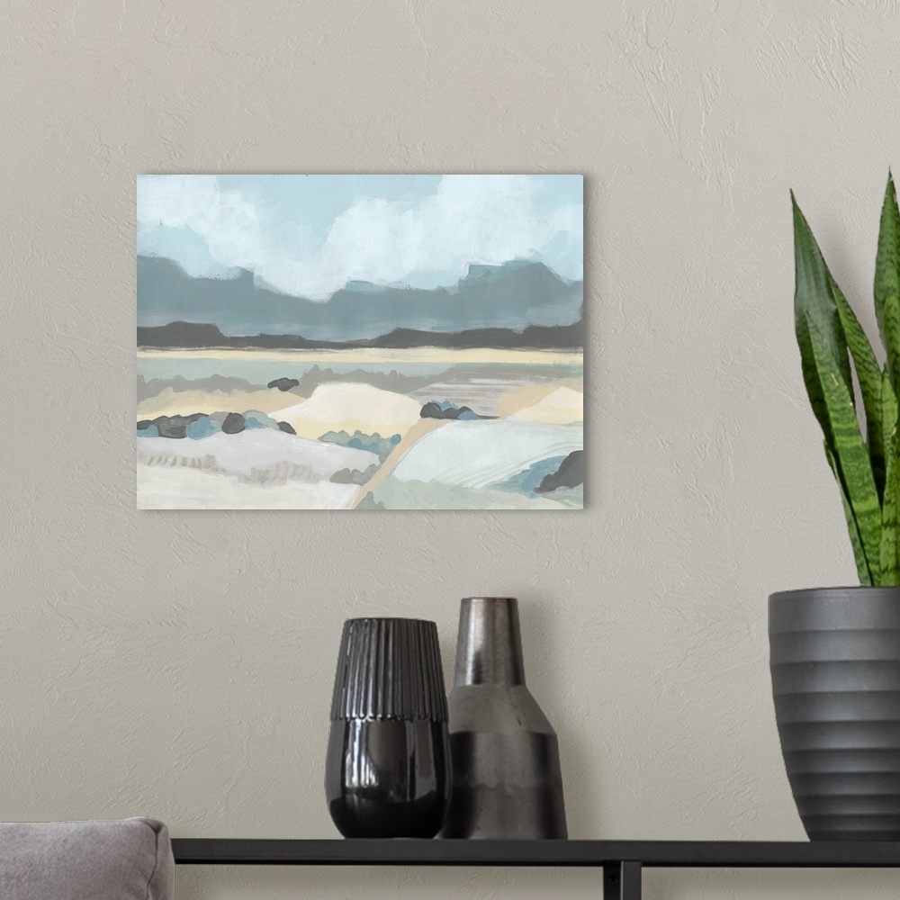 A modern room featuring Abstract landscape painting of a valley with mountains in the distance in pastel hues.