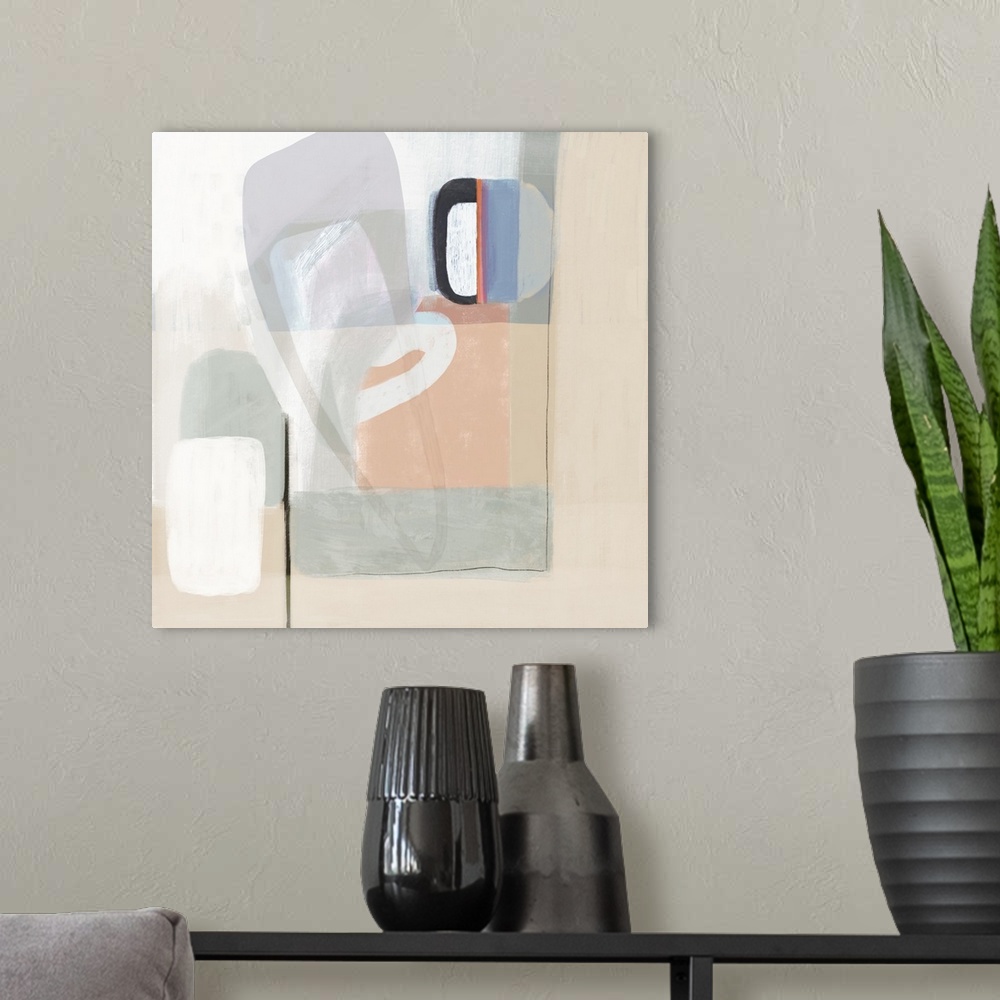 A modern room featuring Contemporary artwork of mod shapes in pastel colors on a neutral background.