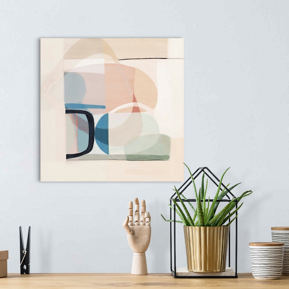 A bohemian room featuring Contemporary artwork of mod shapes in pastel colors on a neutral background.
