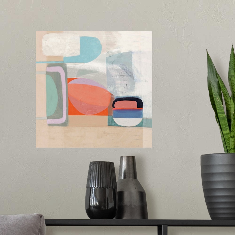 A modern room featuring Contemporary artwork of mod shapes in pastel colors on a neutral background.