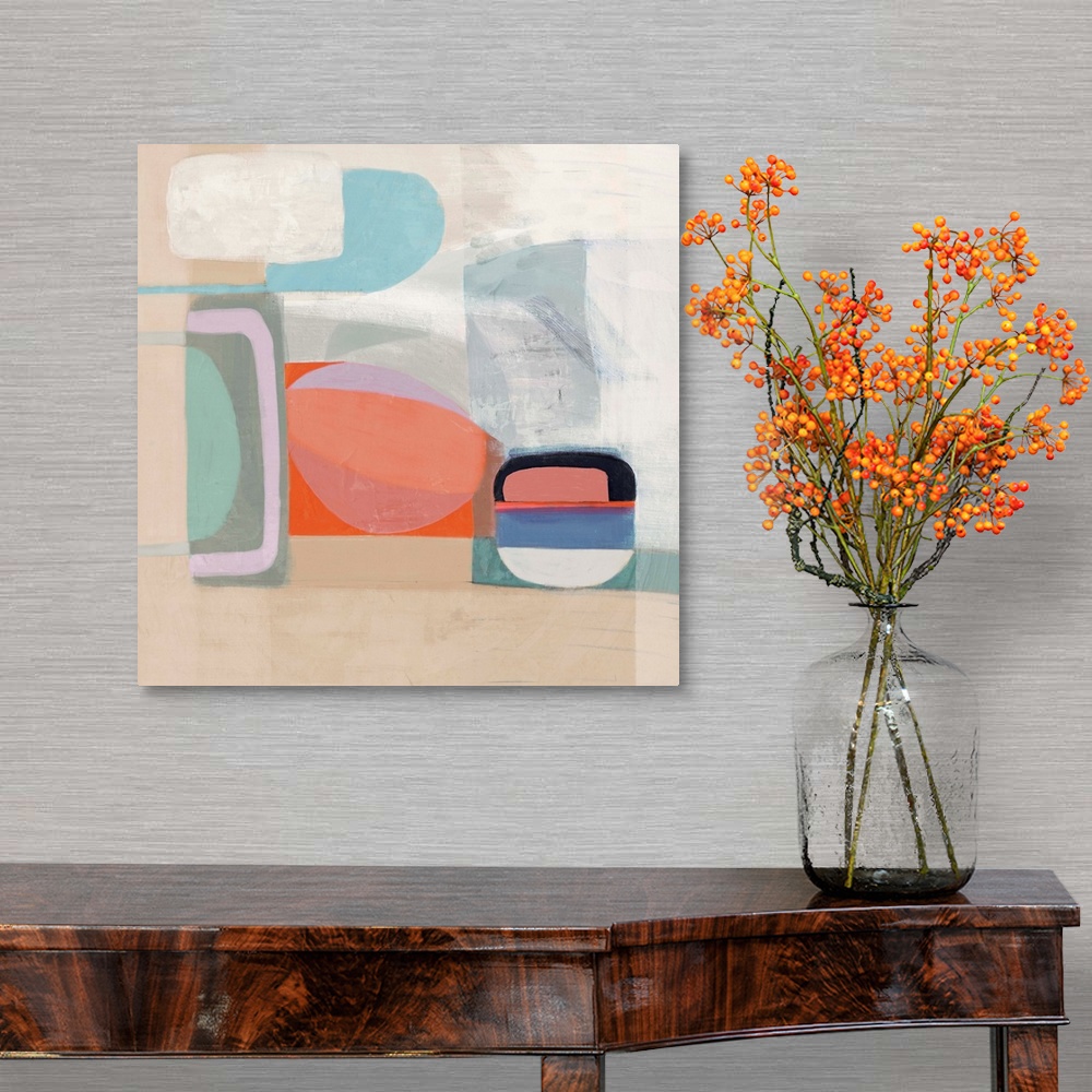 A traditional room featuring Contemporary artwork of mod shapes in pastel colors on a neutral background.