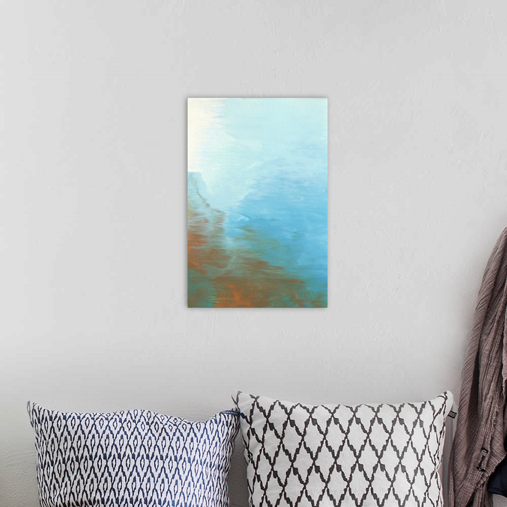 A bohemian room featuring Modern abstract artwork in blue and orange resembling a hazy morning sky.