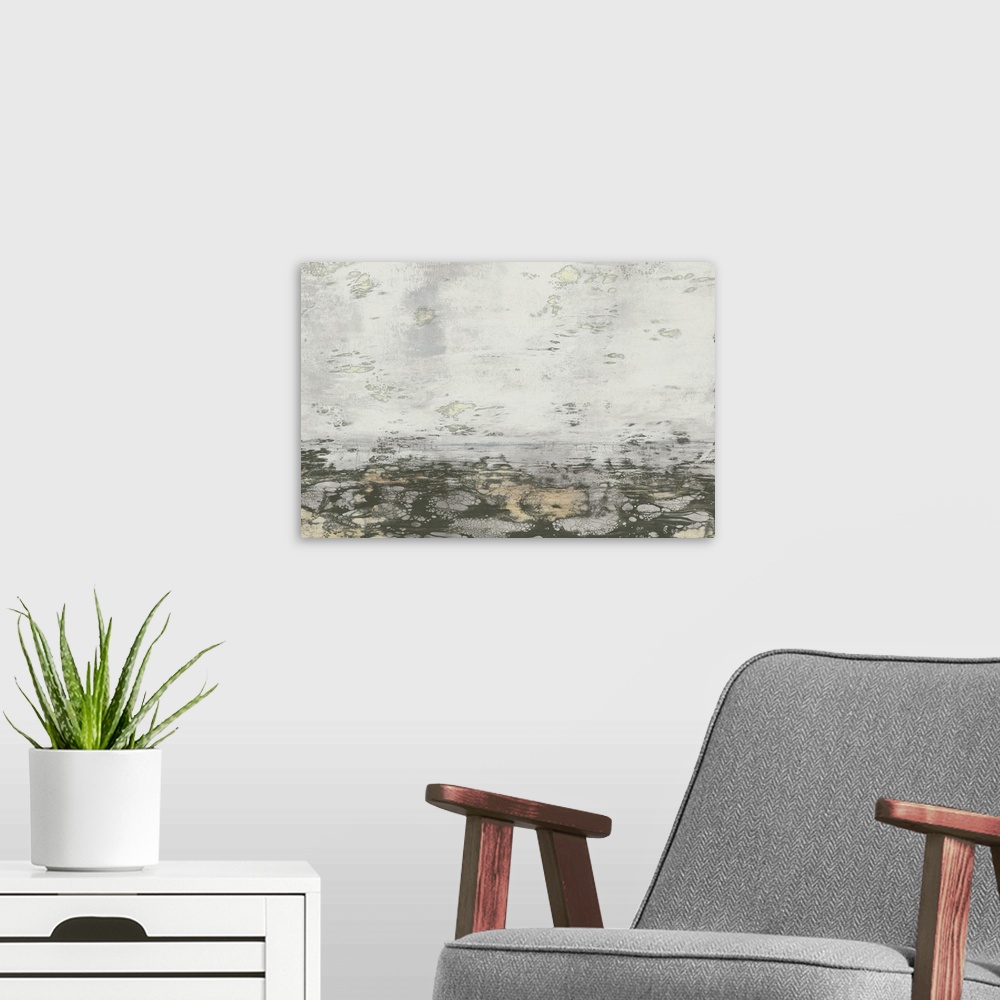A modern room featuring Modern abstract art print of a plain horizon in neutral earth tones under a pale grey sky.