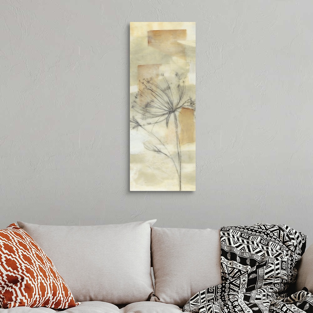 A bohemian room featuring Vertical artwork of a soft dandelion flower on neutral earth tones.