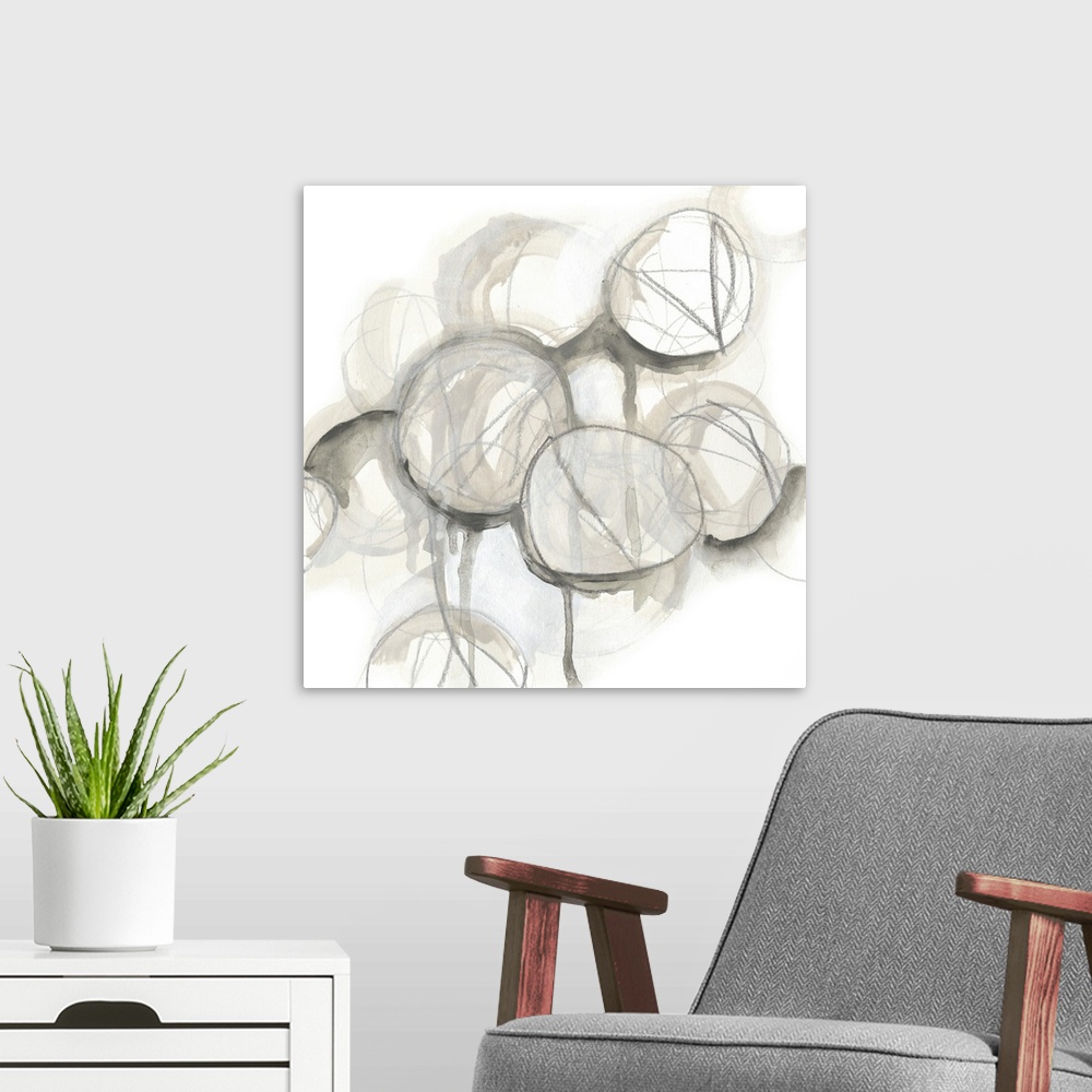A modern room featuring Contemporary watercolor abstract painting consisting of various circular shapes in neutral tones.