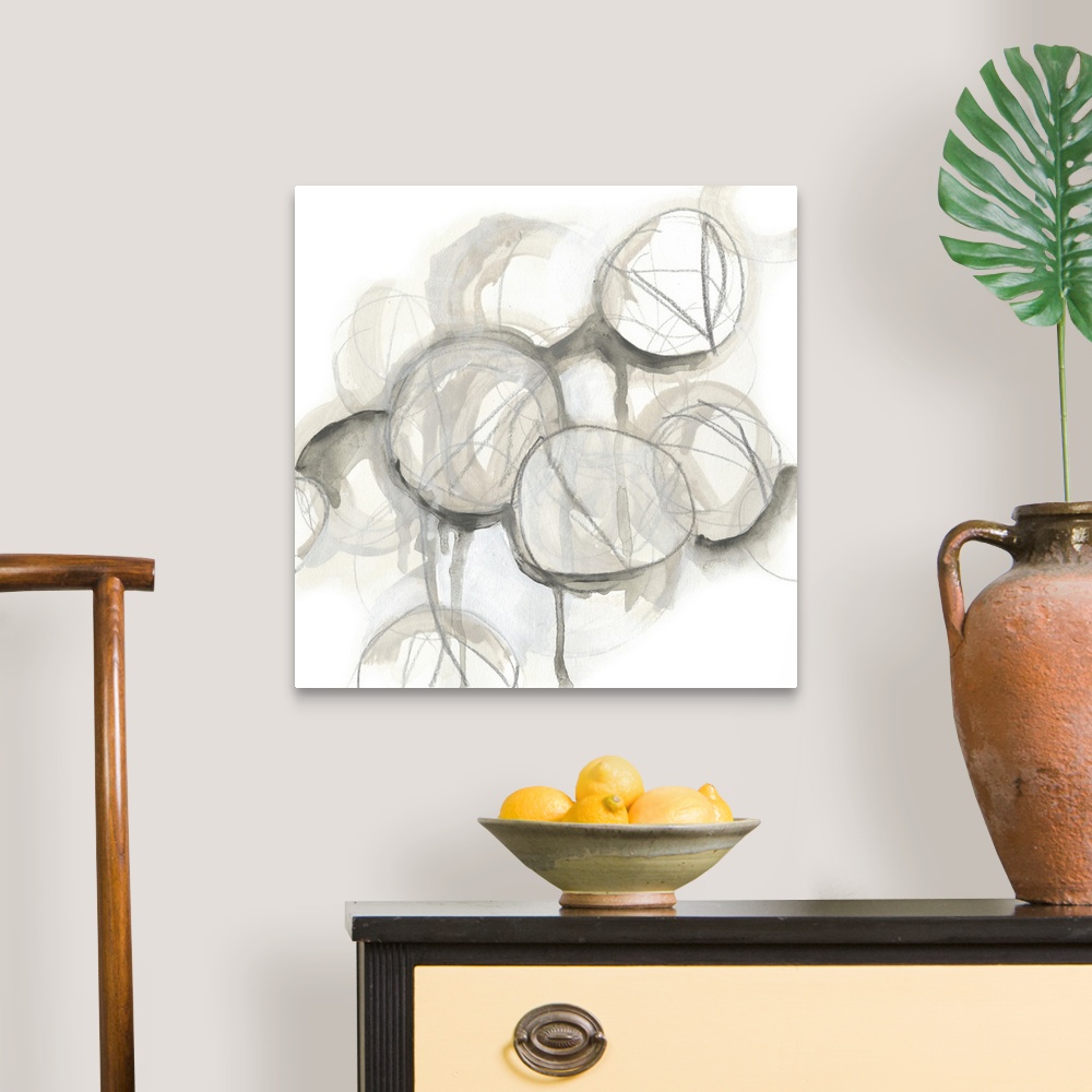 A traditional room featuring Contemporary watercolor abstract painting consisting of various circular shapes in neutral tones.