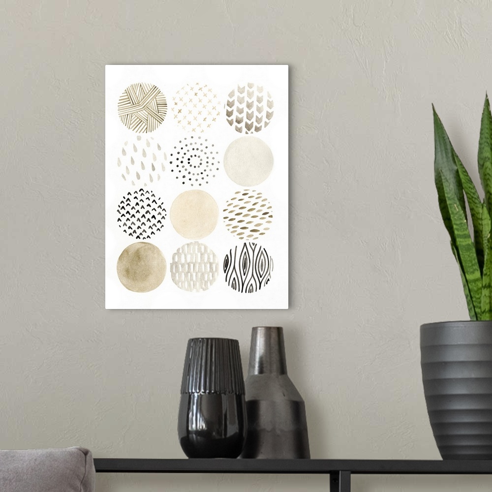 A modern room featuring Twelve circles with different patterns in earth tones.
