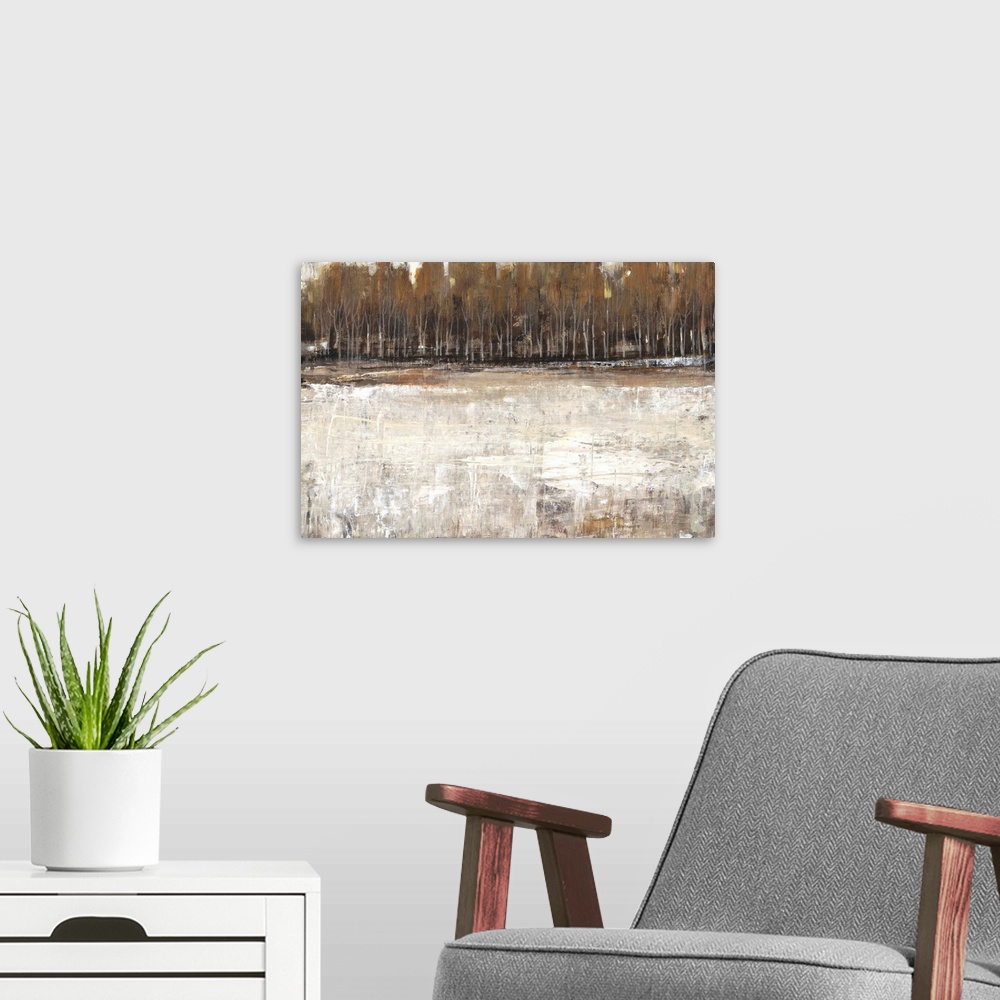 A modern room featuring Abstract landscape artwork of a forest at the edge of a lake in earth tones.