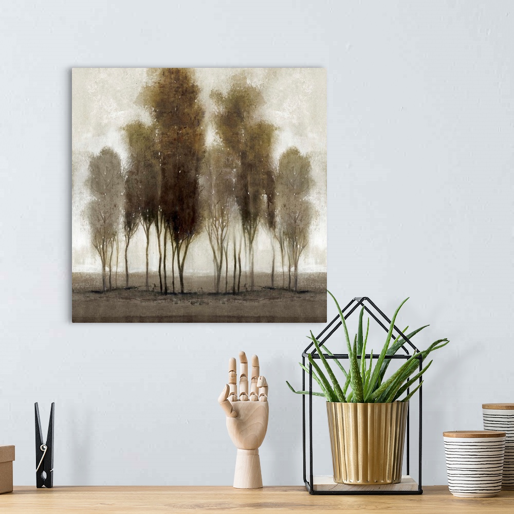 A bohemian room featuring Contemporary painting of a group of trees in a line, in neutral tones.